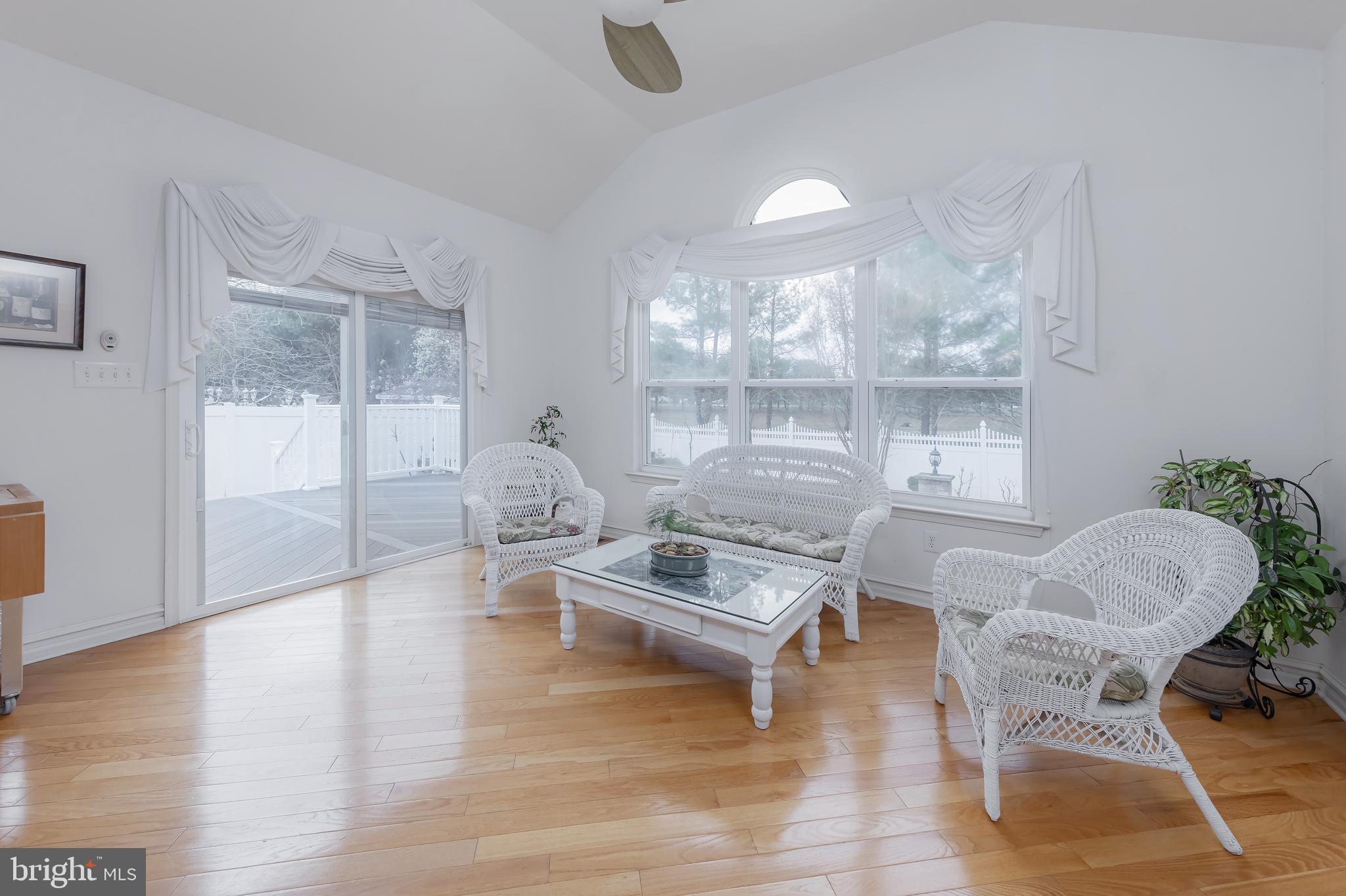 316 Pickwick Drive Williamstown, NJ 08094 - Photo 12 of 44 a living room with furniture and a floor to ceiling window