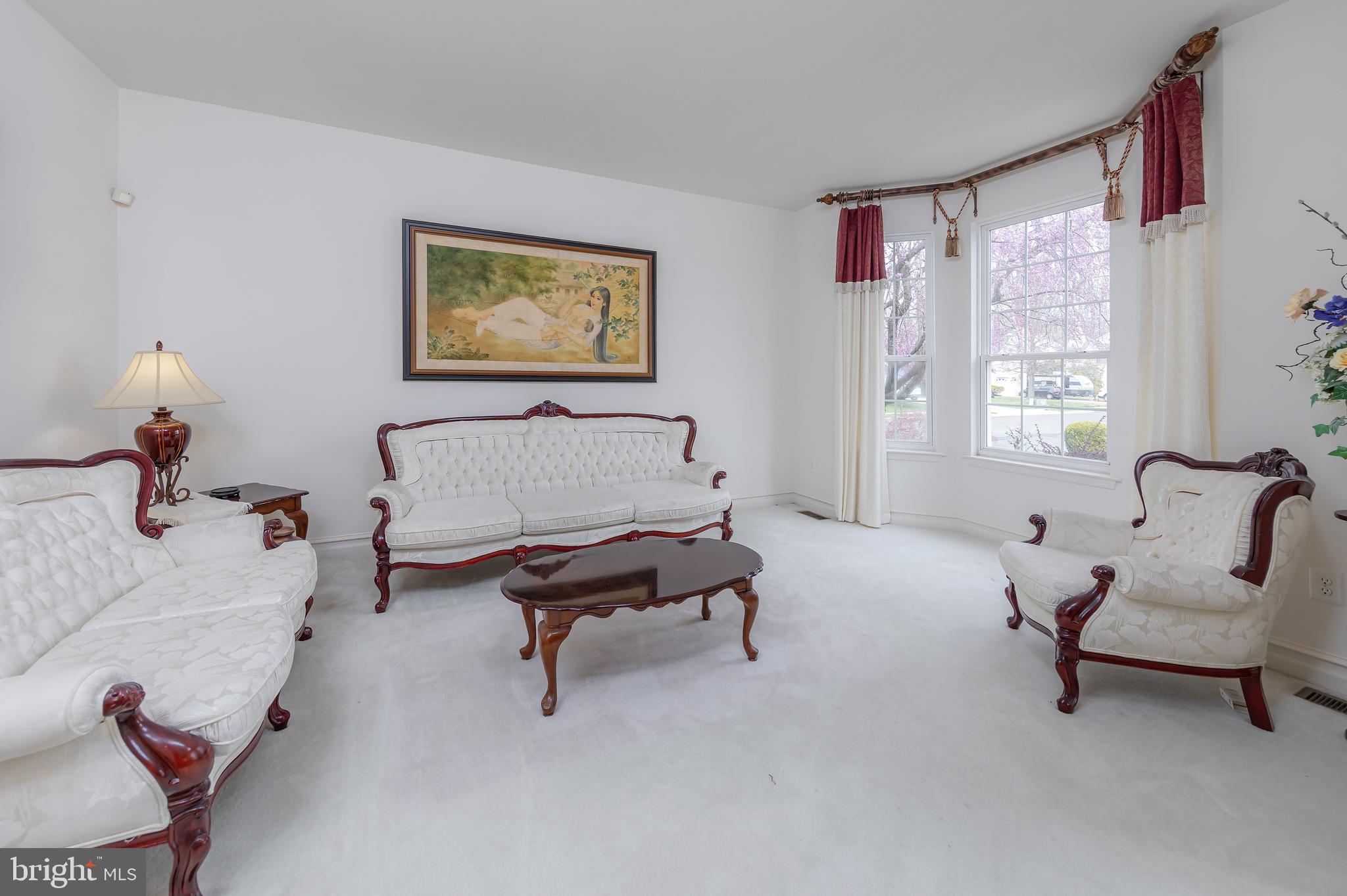 316 Pickwick Drive Williamstown, NJ 08094 - Photo 13 of 44 a living room with furniture and a window