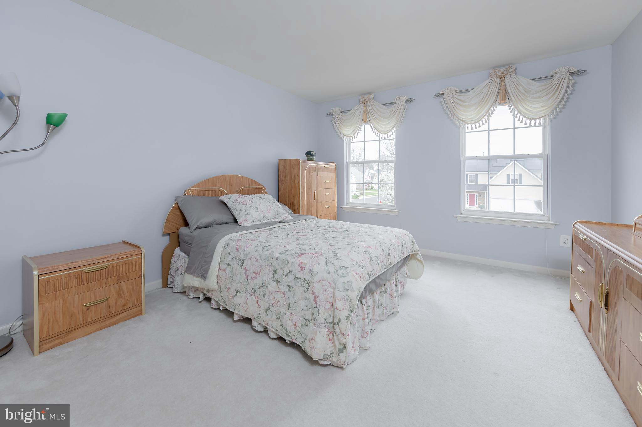 316 Pickwick Drive Williamstown, NJ 08094 - Photo 22 of 44 a bedroom with bed and window