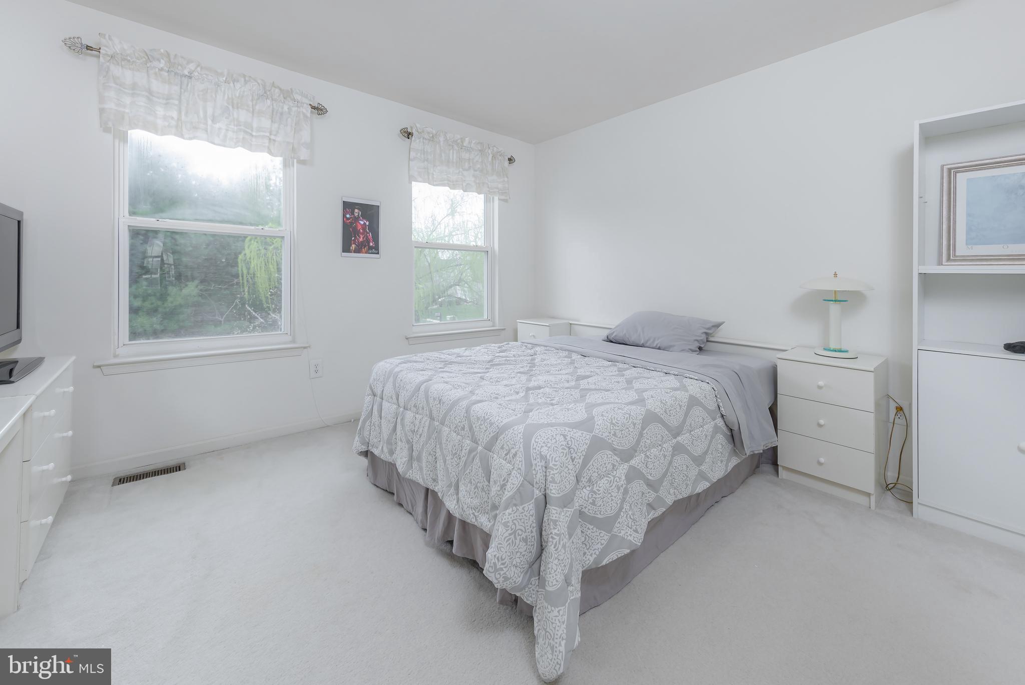 316 Pickwick Drive Williamstown, NJ 08094 - Photo 24 of 44 a bedroom with a bed and a window