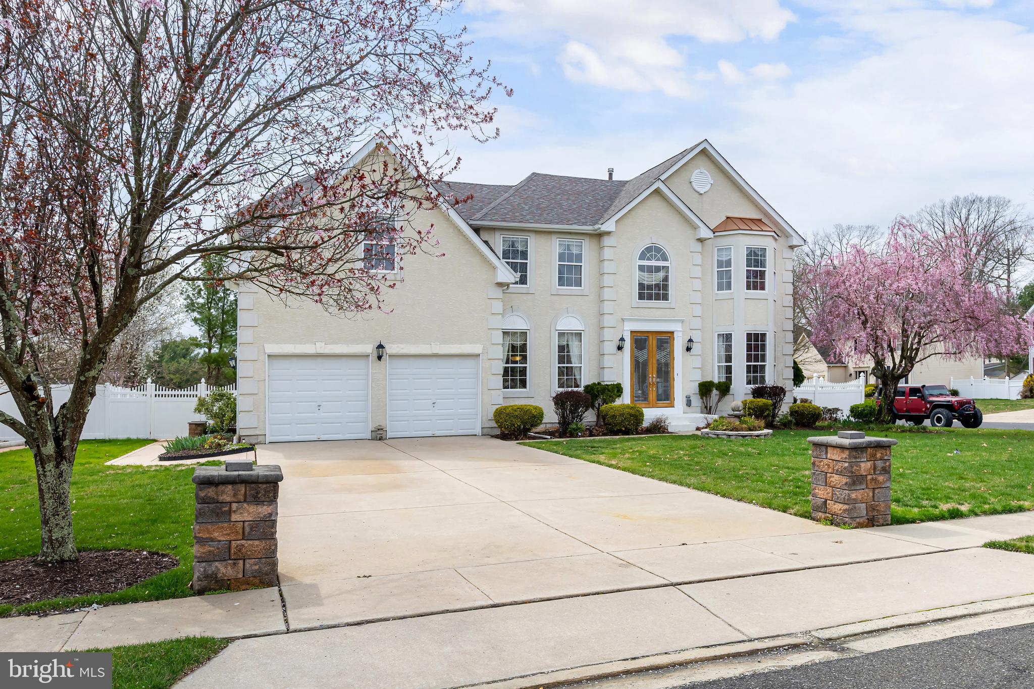 316 Pickwick Drive Williamstown, NJ 08094 - Photo 3 of 44 a view of a white house with a yard and large tree