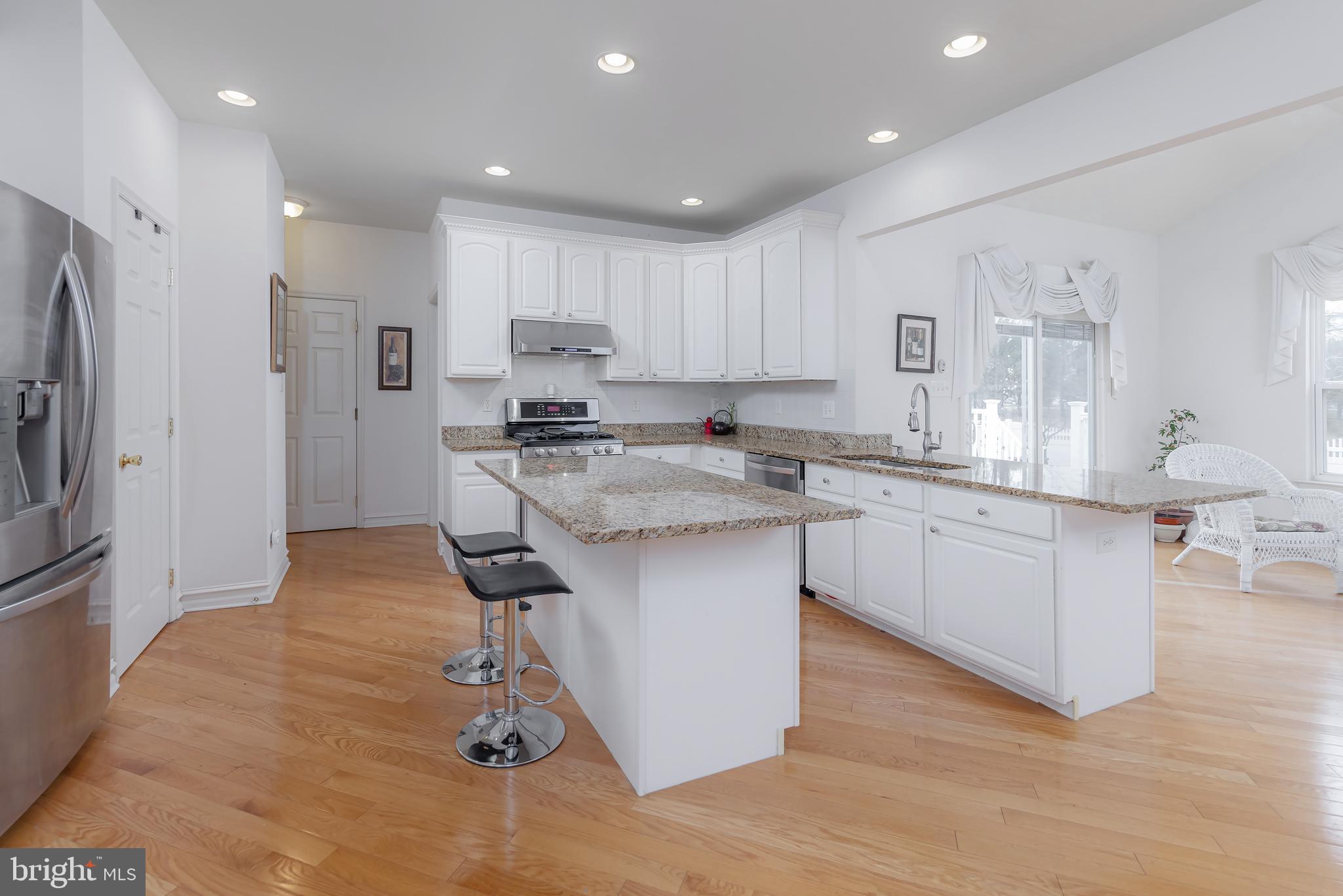 316 Pickwick Drive Williamstown, NJ 08094 - Photo 10 of 44 a kitchen with a sink stainless steel appliances and cabinets