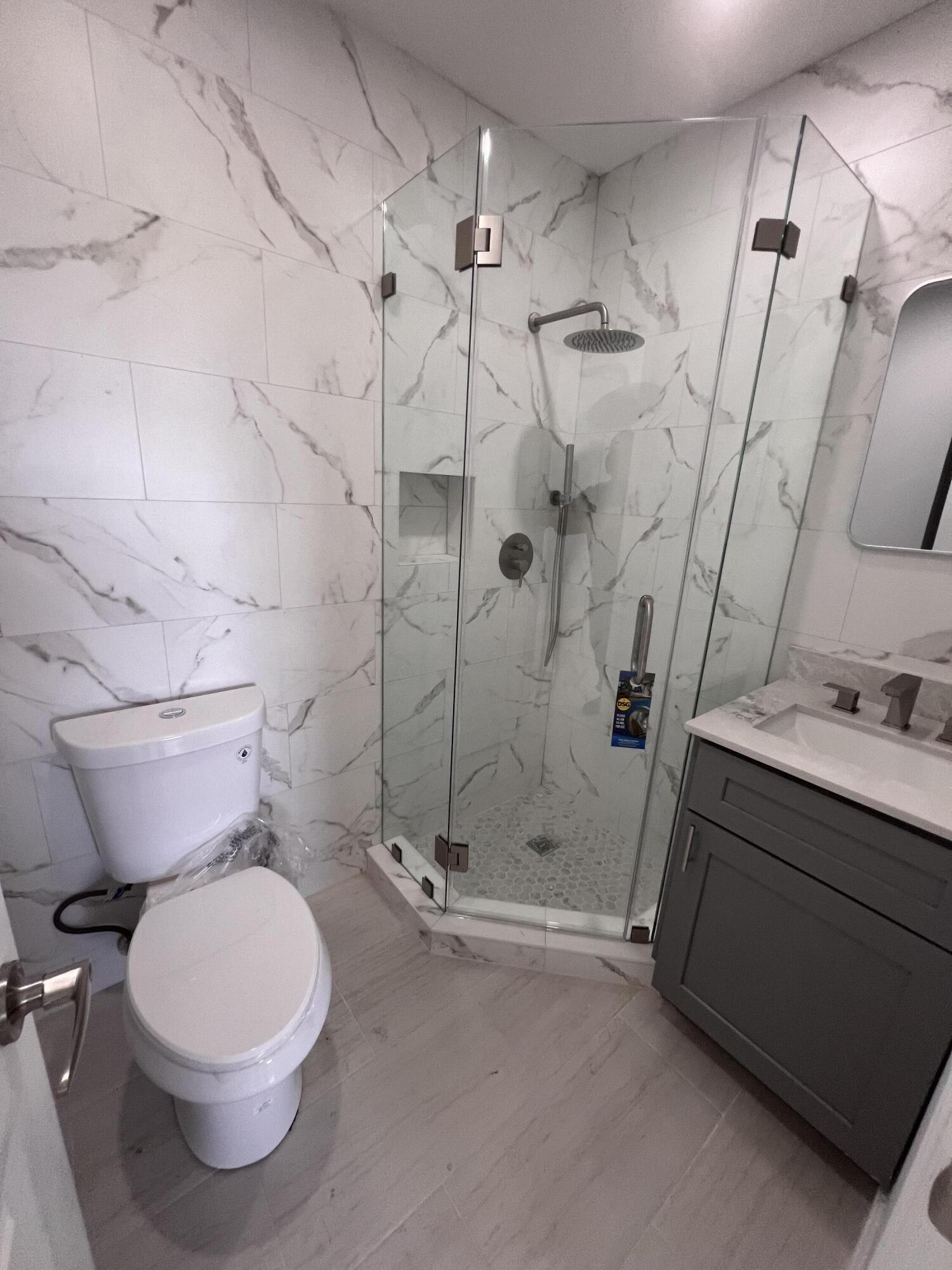 1051 Orange Terrace, Unit 203 Delray Beach, FL 33445 - Photo 16 of 17 2nd Bathroom