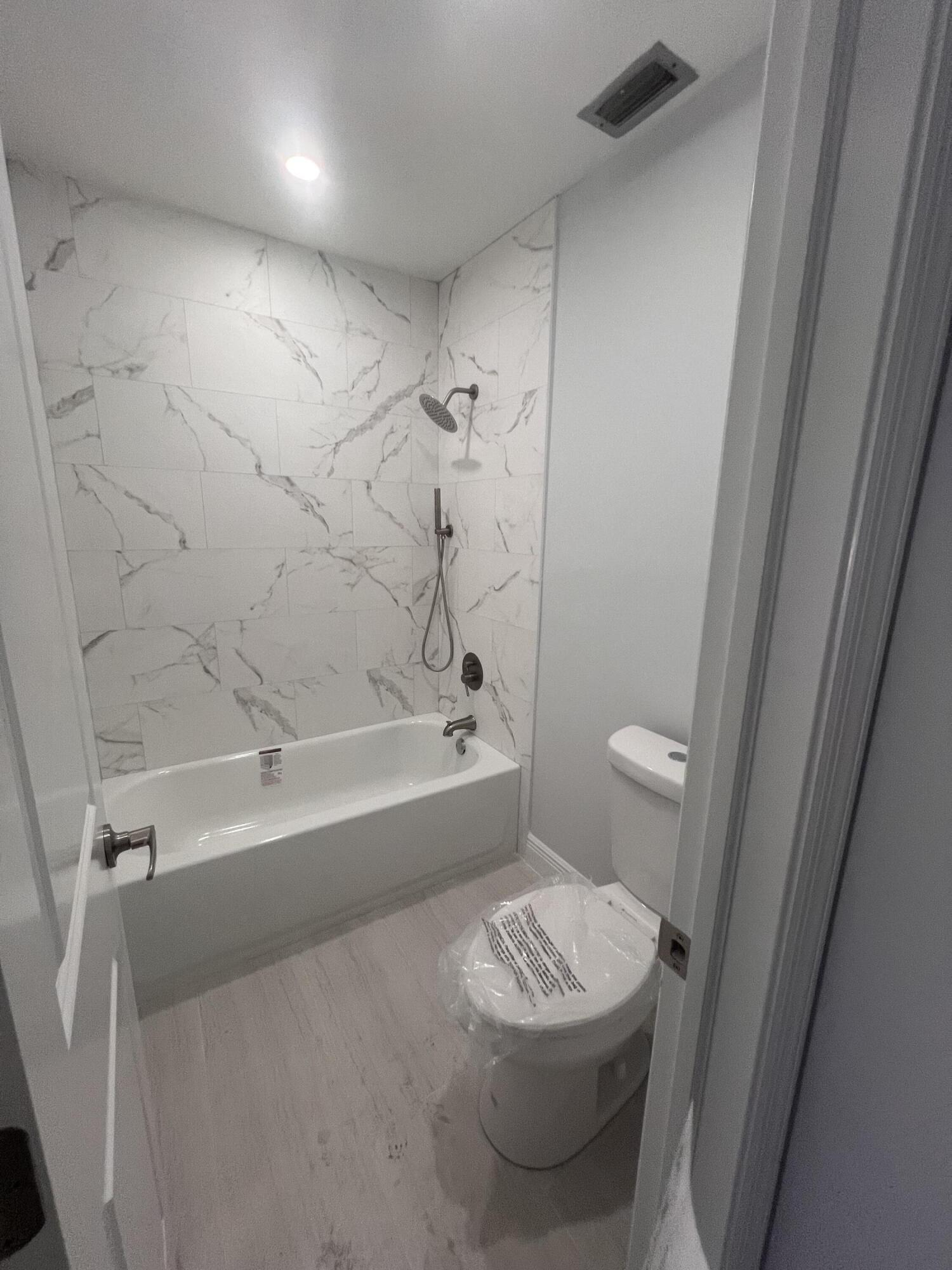 1051 Orange Terrace, Unit 203 Delray Beach, FL 33445 - Photo 9 of 17 Master Bathroom