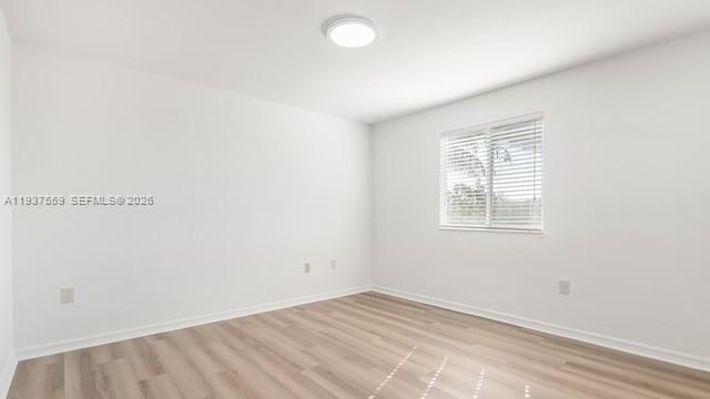 12838 Southwest 47th Street Miramar, FL 33027 - Photo 22 of 40 an empty room with a window