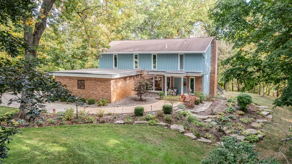 front view of a house with a yard