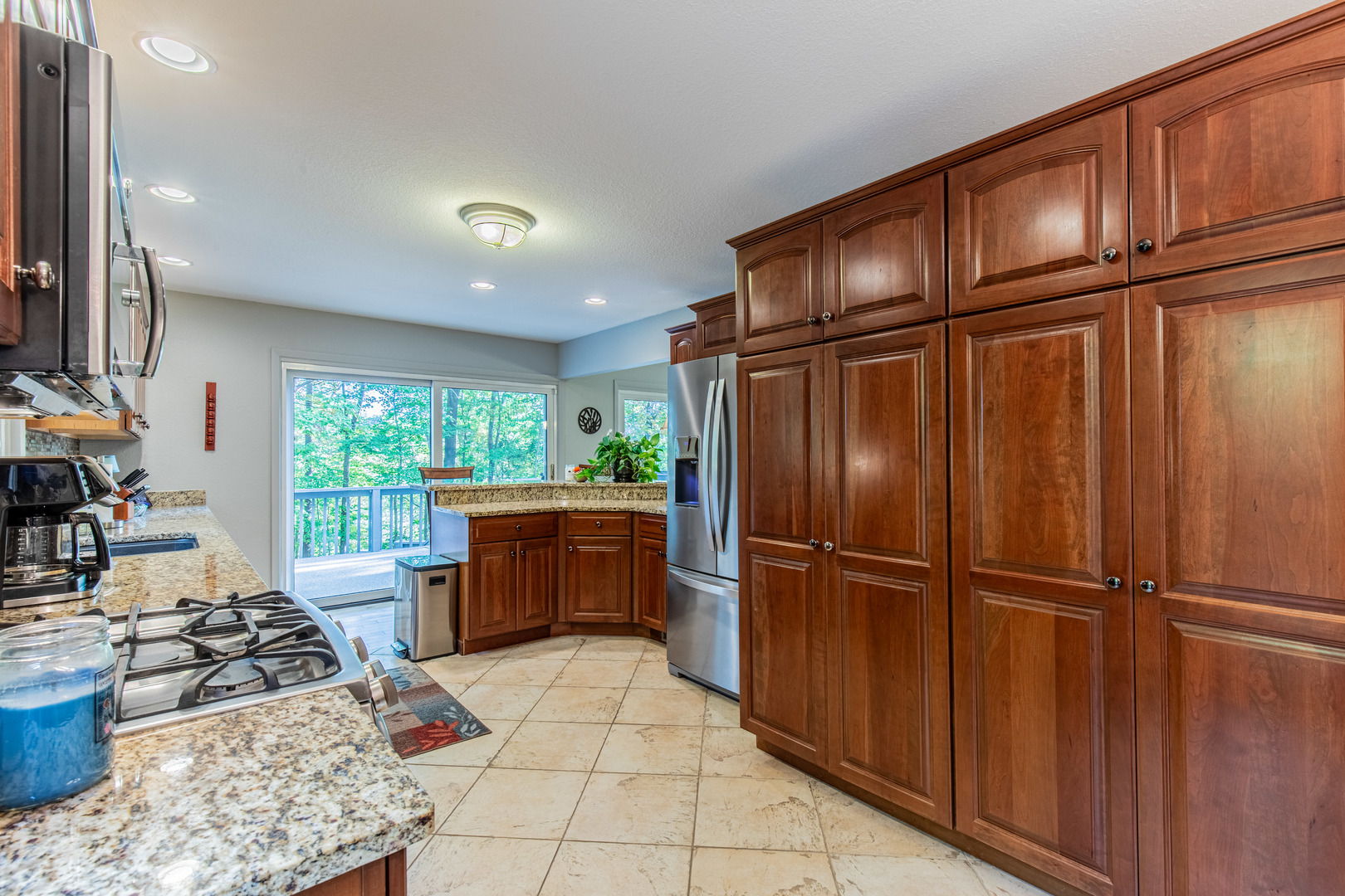 2555 Ridgefield Road Princeton, IL 61356 - Photo 17 of 50 a kitchen with stainless steel appliances granite countertop a refrigerator and a sink