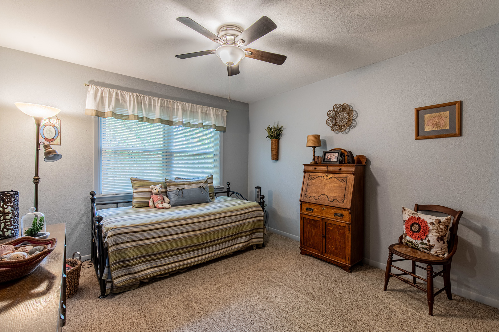 2555 Ridgefield Road Princeton, IL 61356 - Photo 24 of 50 a bedroom with a bed and a chandelier