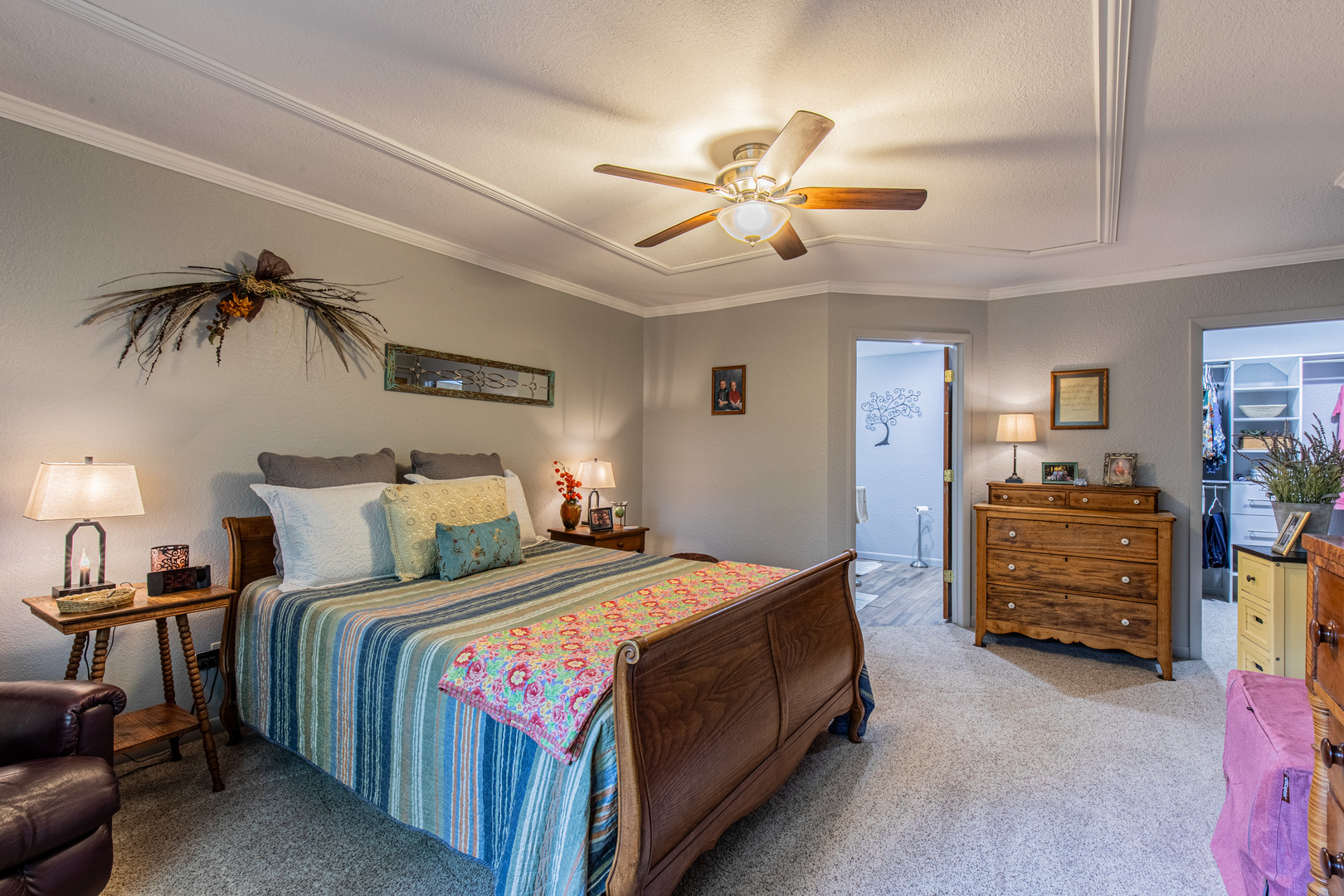 2555 Ridgefield Road Princeton, IL 61356 - Photo 27 of 50 a bedroom with a bed and a chandelier