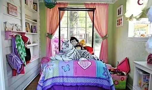 a view of a livingroom with furniture and toys