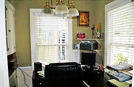 a room with storage and windows