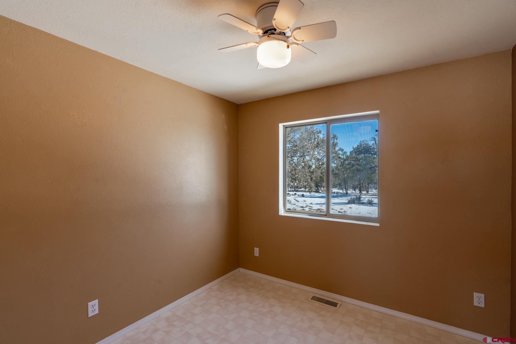 190 Pine Ridge Road Durango, CO 81301 - Photo 8 of 27 a view of an empty room with a window