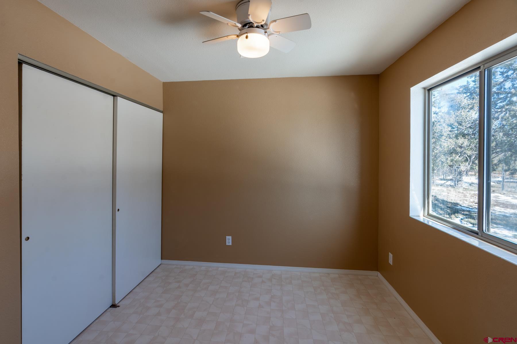 190 Pine Ridge Road Durango, CO 81301 - Photo 9 of 27 an empty room with a window