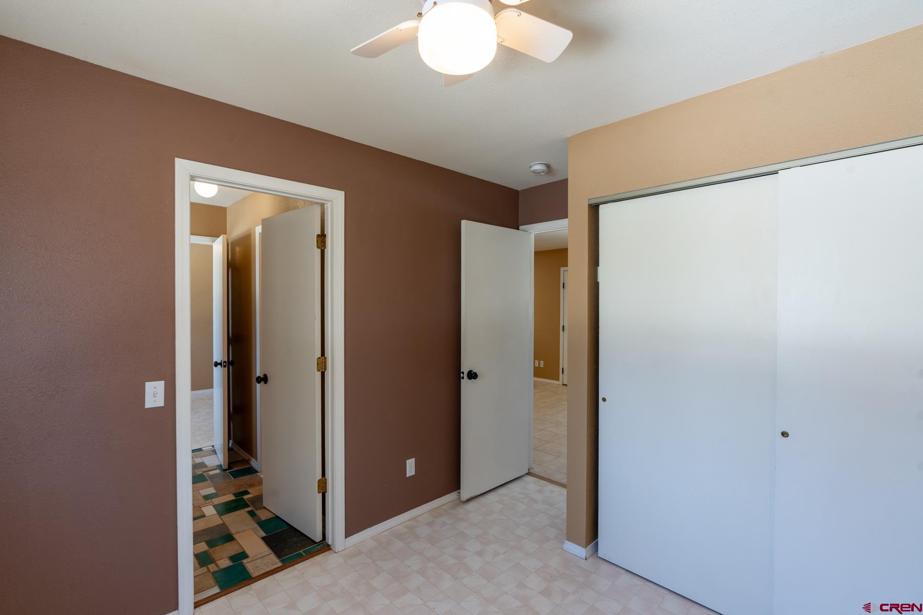 190 Pine Ridge Road Durango, CO 81301 - Photo 10 of 27 a view of a bathroom with a shower and a mirror