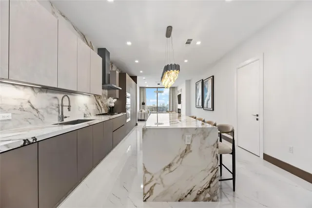a bathroom with a double vanity sink and mirror