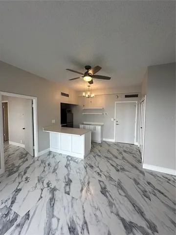 a view of a livingroom with a flat screen tv