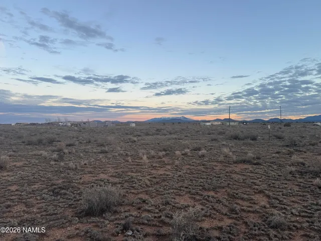 a view of ocean and mountain