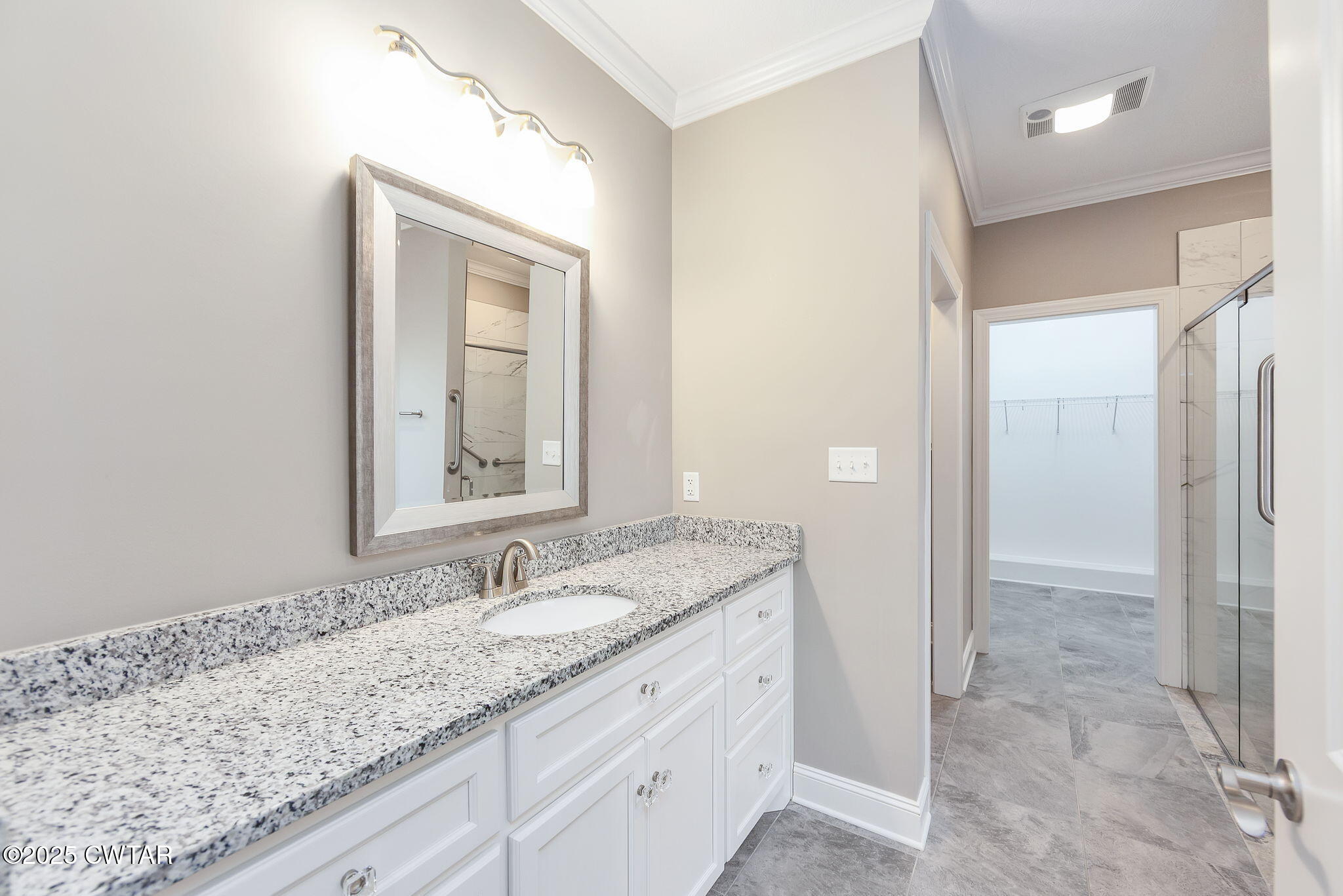 92 Samuel Drive Jackson, TN 38305 - Photo 14 of 23 a bathroom with a granite countertop sink and a mirror