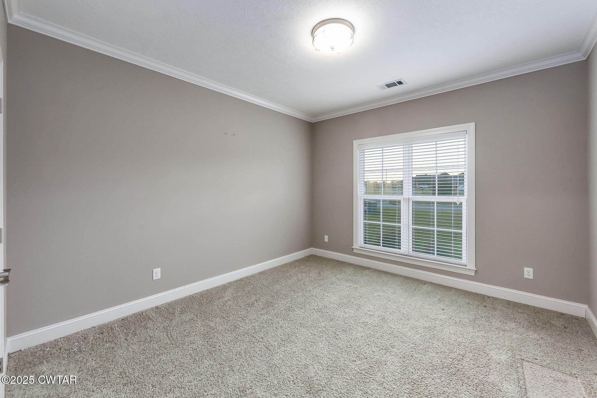92 Samuel Drive Jackson, TN 38305 - Photo 20 of 23 an empty room with a window