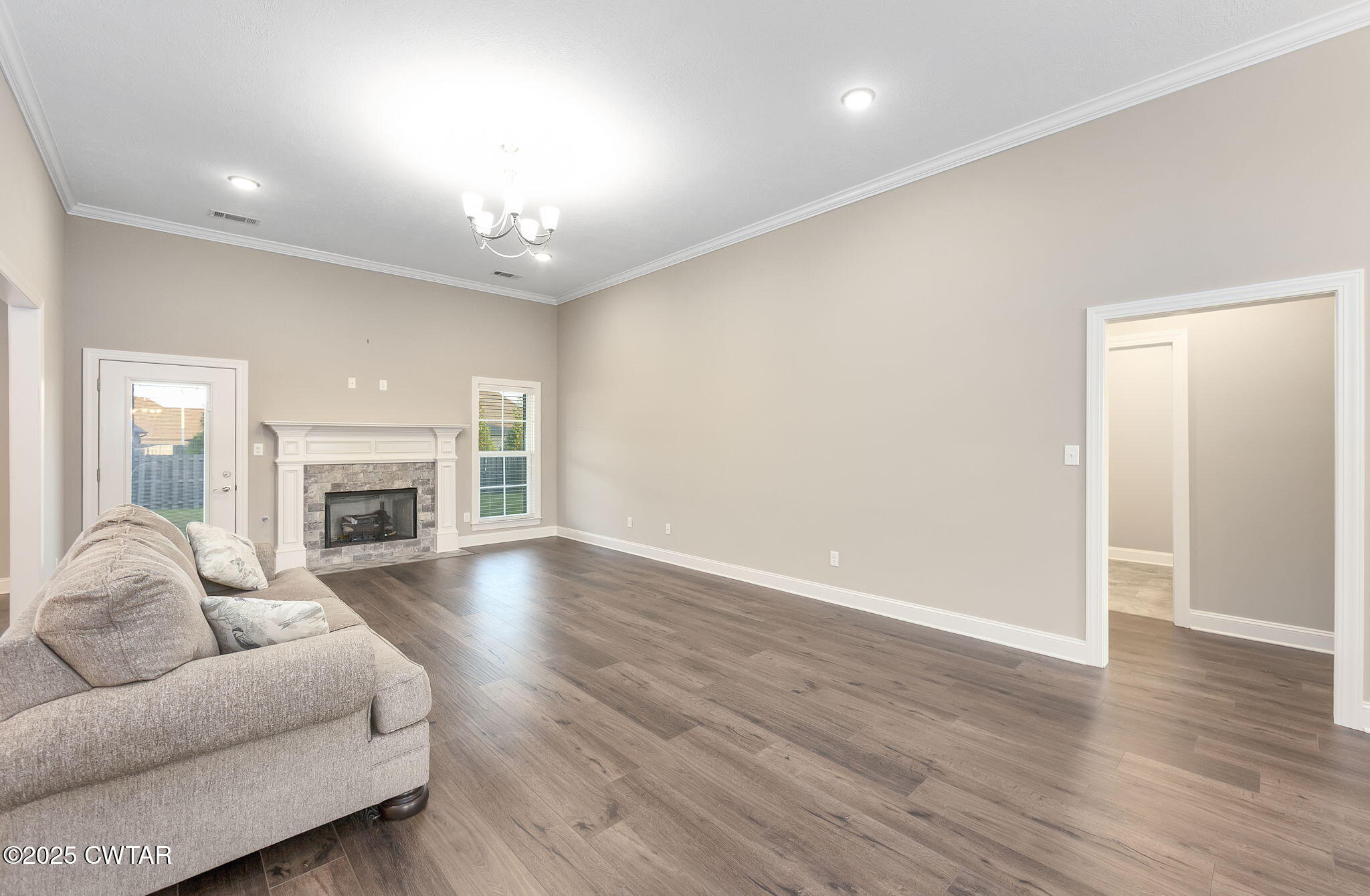 92 Samuel Drive Jackson, TN 38305 - Photo 3 of 23 a living room with furniture and a fireplace