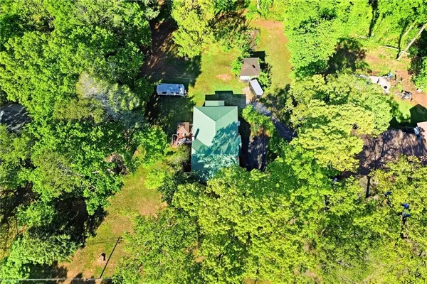a backyard of a house with lots of green space