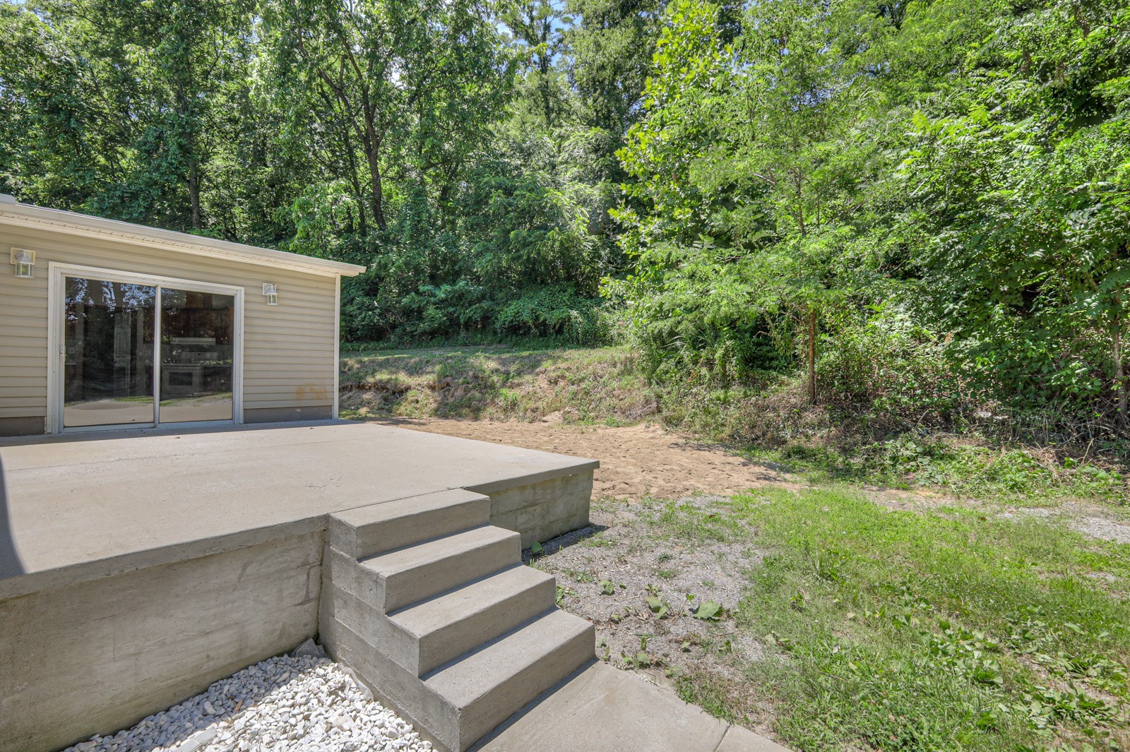 4002 Rippey Lake Road Mount Pleasant, TN 38474 - Photo 27 of 43 a view of a backyard with large trees