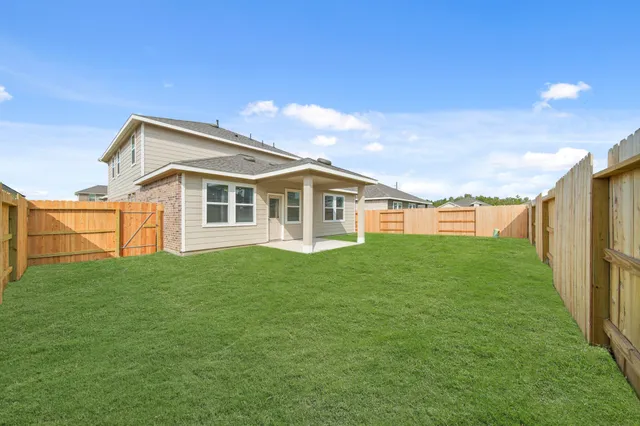 a house view with a garden space
