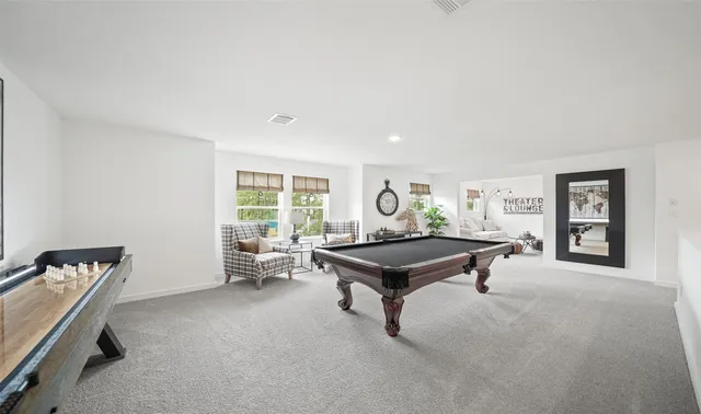 a workspace with furniture and a window