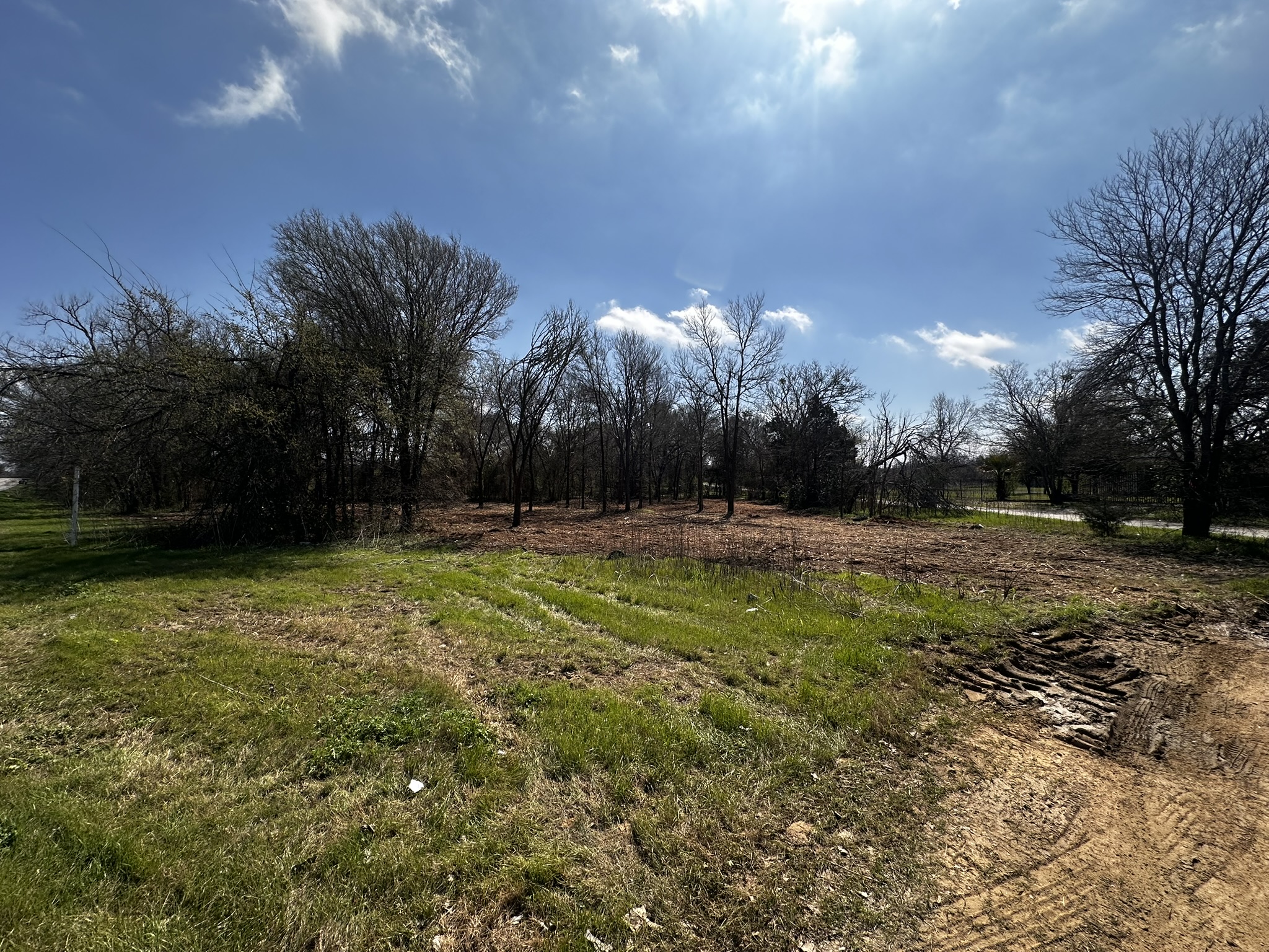 a view of outdoor space with deck and yard