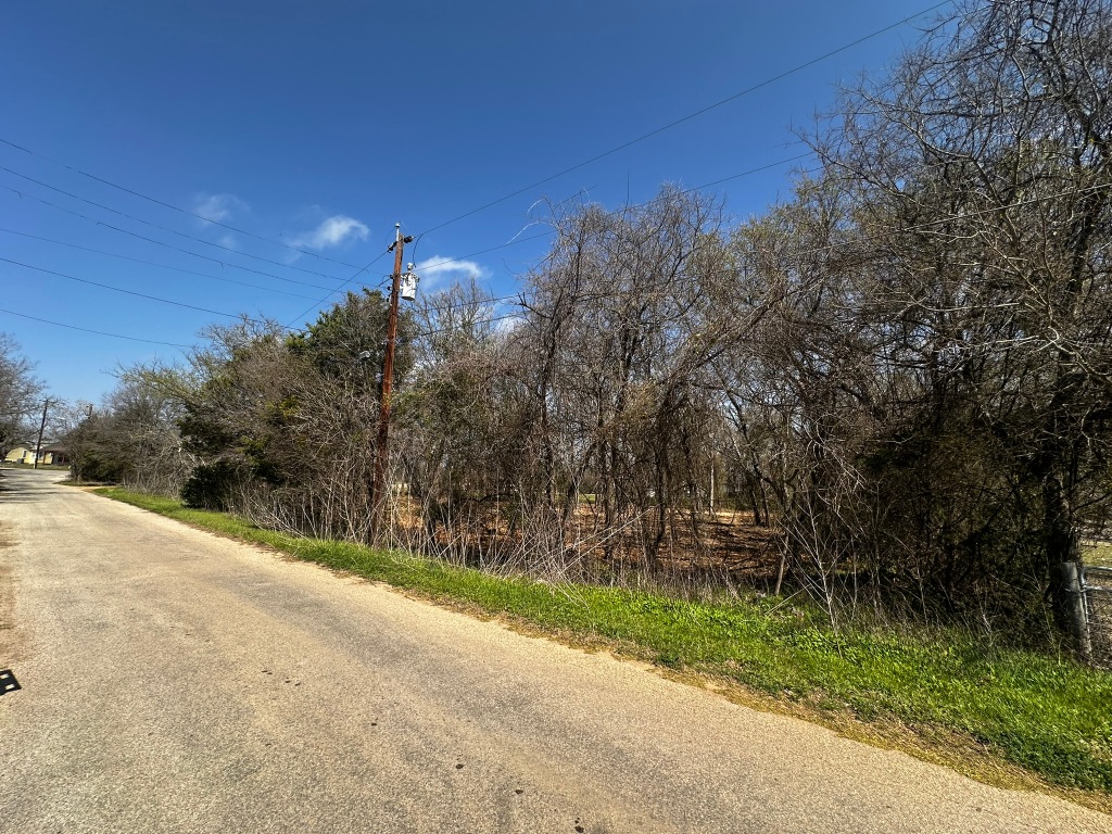 0 East 2nd Street Elgin, TX 78621 - Photo 3 of 24 a view of a street with a building in the background