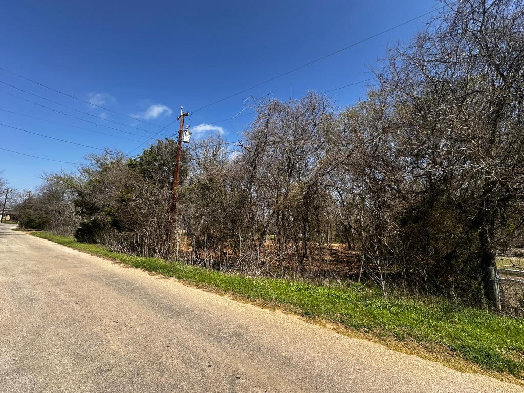 0 East 2nd Street Elgin, TX 78621 - Photo 4 of 24 a view of a street with a building in the background