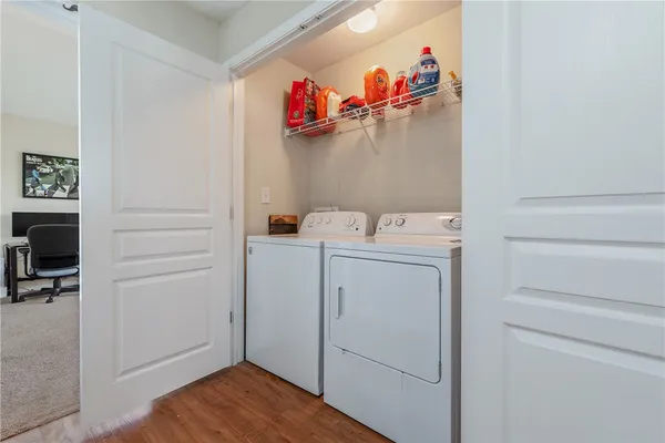 a utility room with dryer and washer