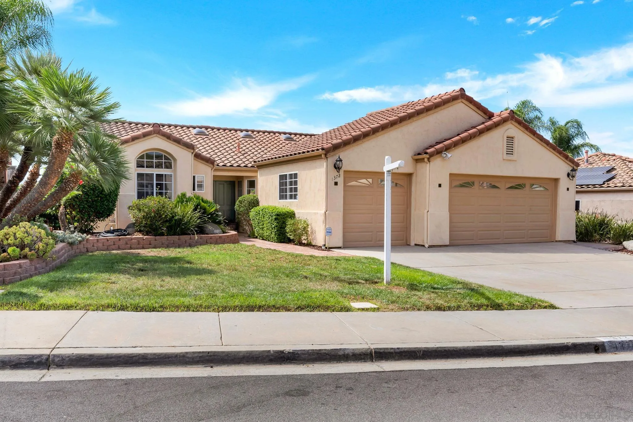 a house view with a outdoor space