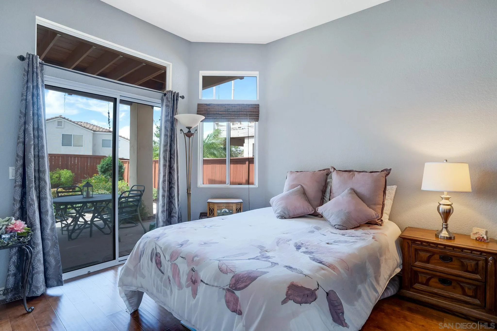 1372 Graham Place Escondido, CA 92026 - Photo 18 of 63 a bedroom with a large bed and a large window