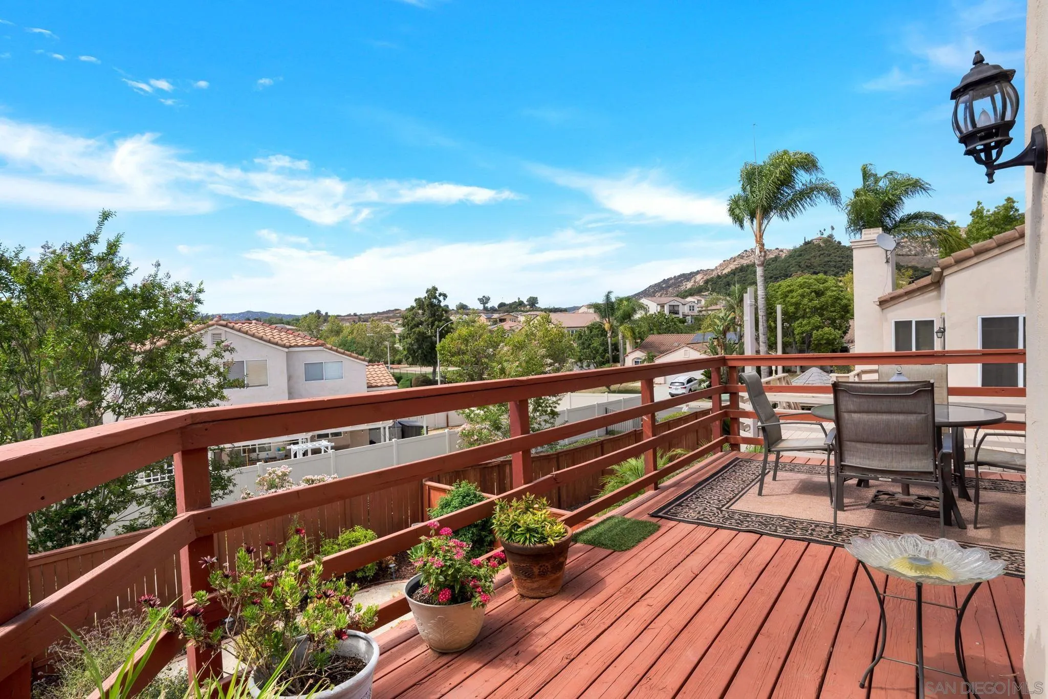 1372 Graham Place Escondido, CA 92026 - Photo 2 of 63 a view of a balcony with wooden floor and seating space