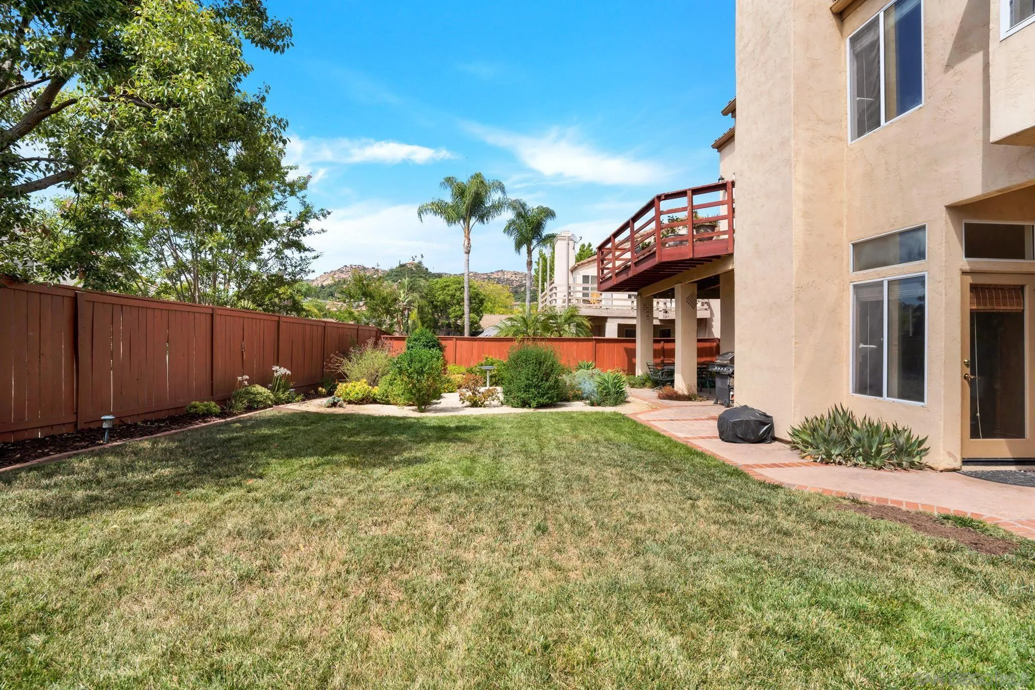 1372 Graham Place Escondido, CA 92026 - Photo 42 of 63 a view of a house with backyard and sitting area