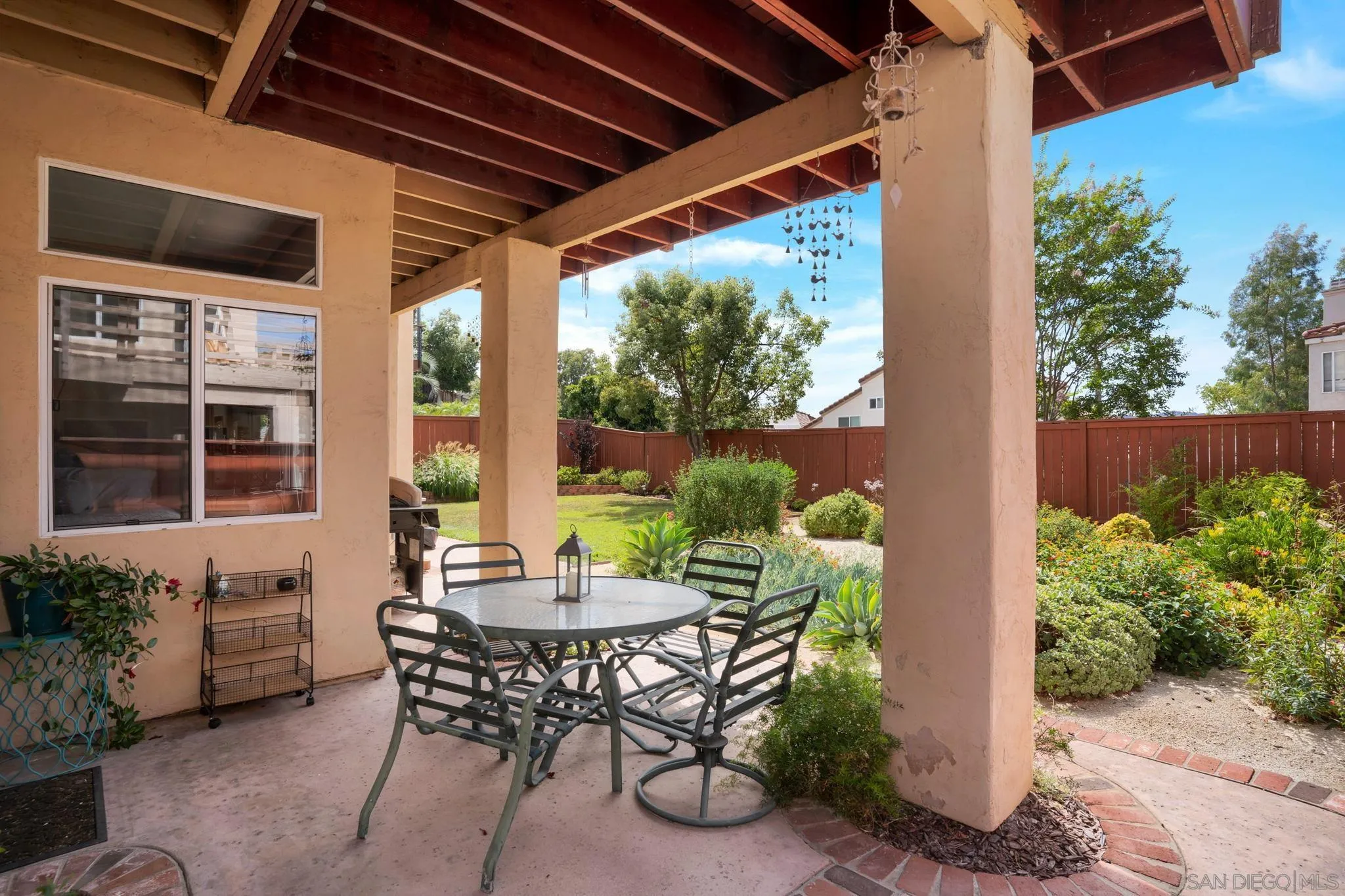 1372 Graham Place Escondido, CA 92026 - Photo 46 of 63 a view of an outdoor dining space with a table and chairs