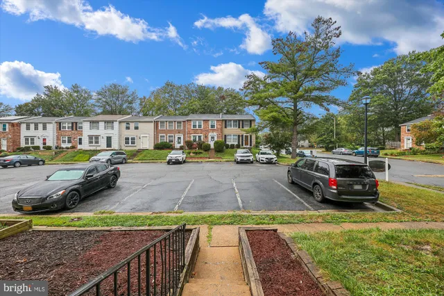 a view of swimming pool with seating space and deck