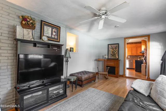 a view of entryway with wooden floor