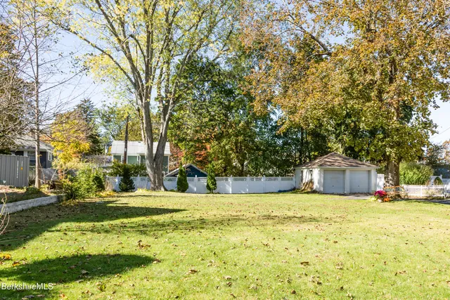 a view of a house with a big yard