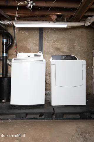 a view of a backyard with swimming pool