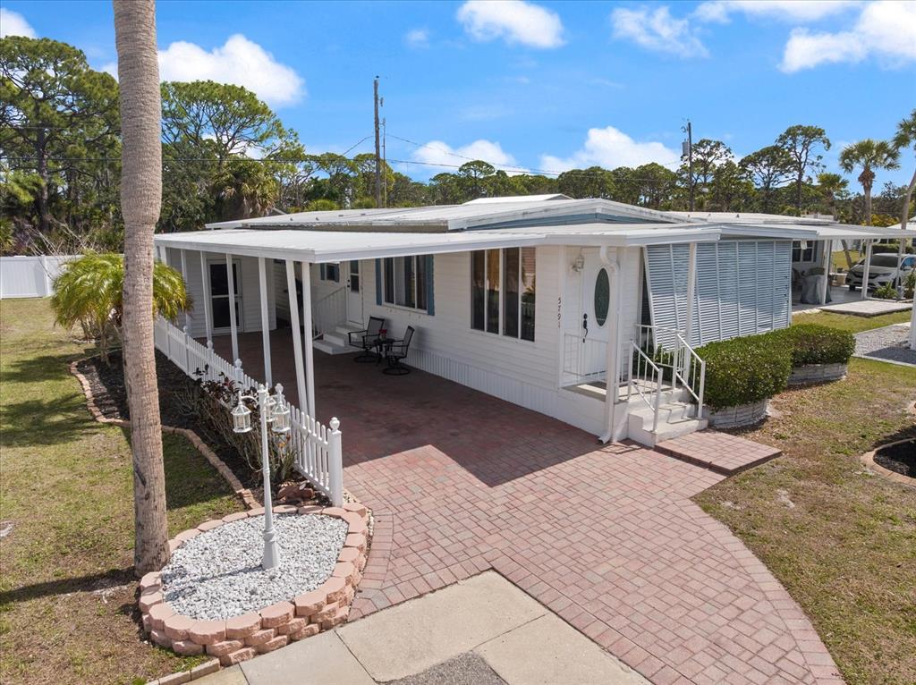 5791 Orange Blossom Road Venice, FL 34293 - Photo 1 of 55 a view of a house with backyard