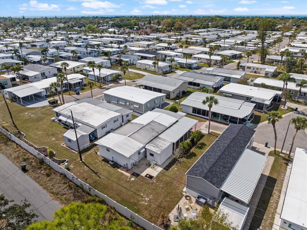 5791 Orange Blossom Road Venice, FL 34293 - Photo 23 of 55 an aerial view of a residential houses with yard
