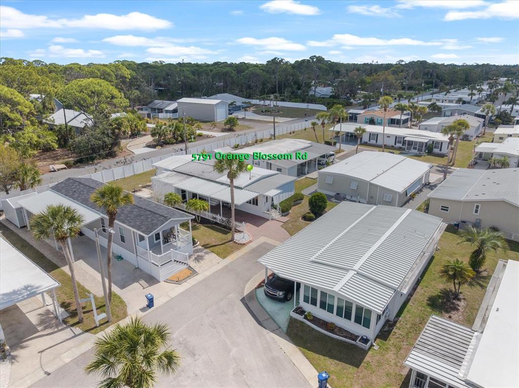 5791 Orange Blossom Road Venice, FL 34293 - Photo 33 of 55 an aerial view of a house with a garden