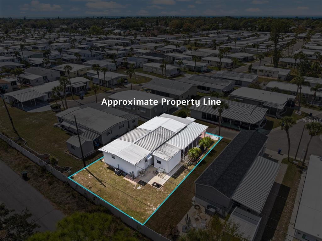 5791 Orange Blossom Road Venice, FL 34293 - Photo 34 of 55 an aerial view of a yard