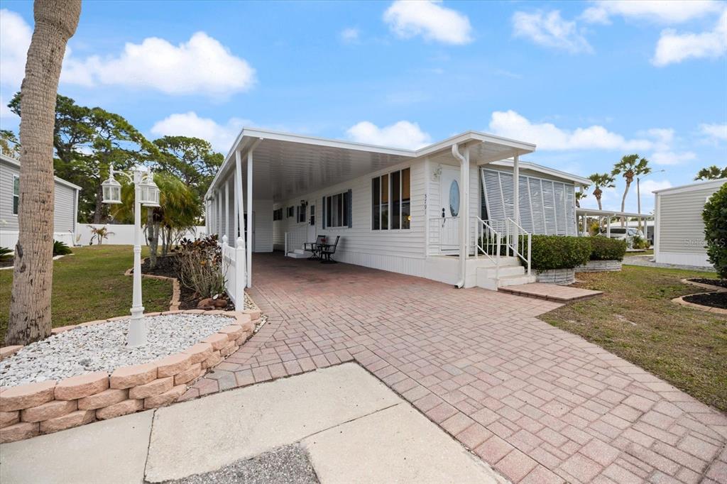 5791 Orange Blossom Road Venice, FL 34293 - Photo 36 of 55 a view of a house with a patio