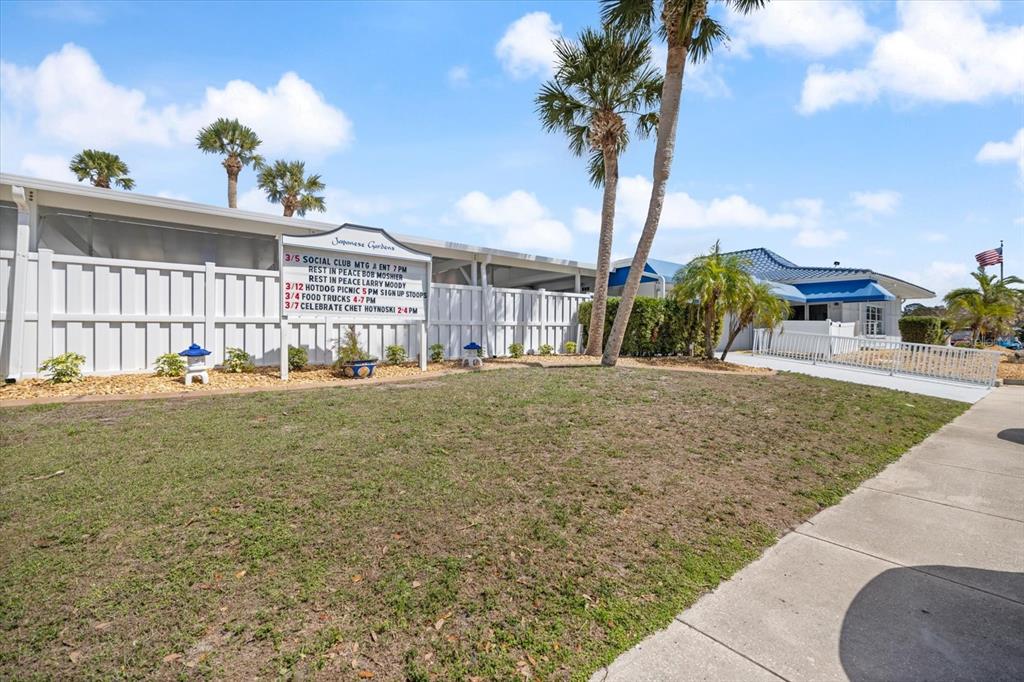 5791 Orange Blossom Road Venice, FL 34293 - Photo 42 of 55 a front view of a house with garden