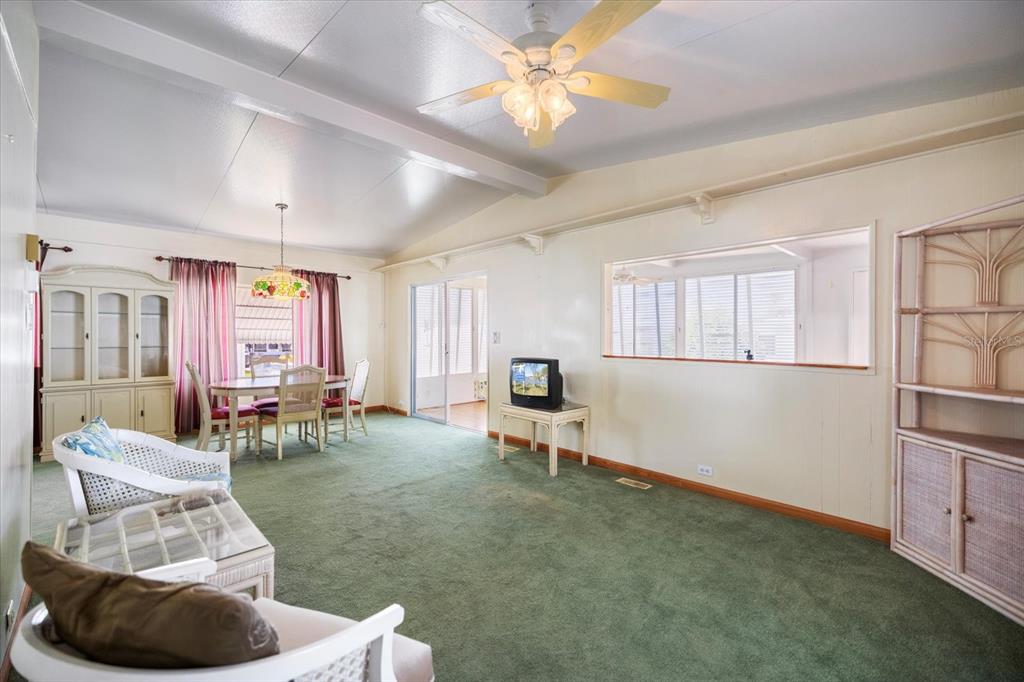 5791 Orange Blossom Road Venice, FL 34293 - Photo 5 of 55 a living room with furniture and a window