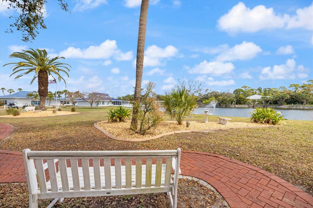 5791 Orange Blossom Road Venice, FL 34293 - Photo 54 of 55 a view of ocean with a palm tree and ocean view