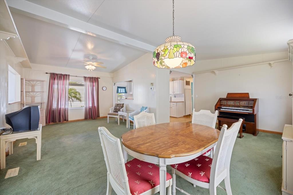5791 Orange Blossom Road Venice, FL 34293 - Photo 7 of 55 a view of a dining room with furniture